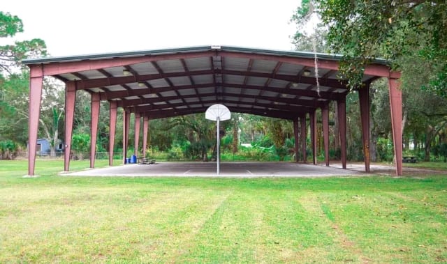 Pavilion with basketball court at Kid Jones Park in LaBelle, Florida.