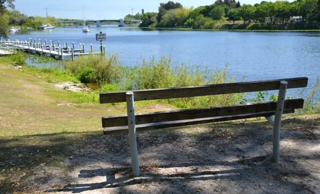 Wooden bench overlooking the Caloosahatchee River at Bob Mason Park in LaBelle, Florida